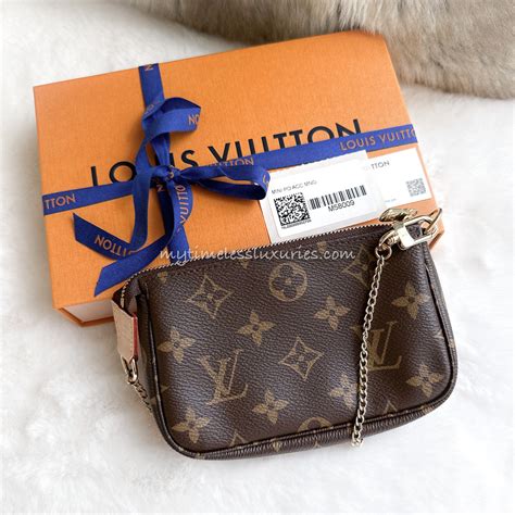 louis vuitton pouchette mini|Louis Vuitton mini pochette price.